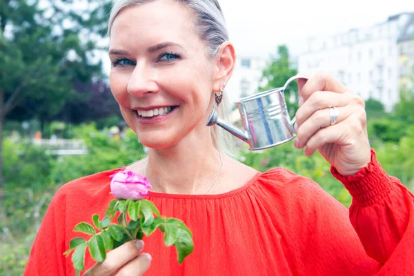 Portrait Blond Woman Watering Miniature Can Flower — Stock Photo, Image