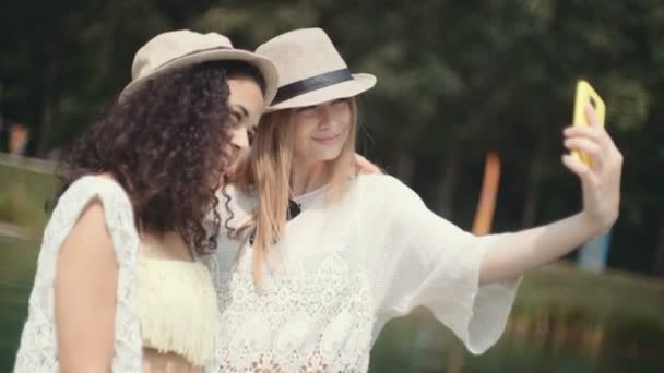 Two Cheerful Girls Making Selfies Lake Girl Friends Taking Selfie — Stock Video