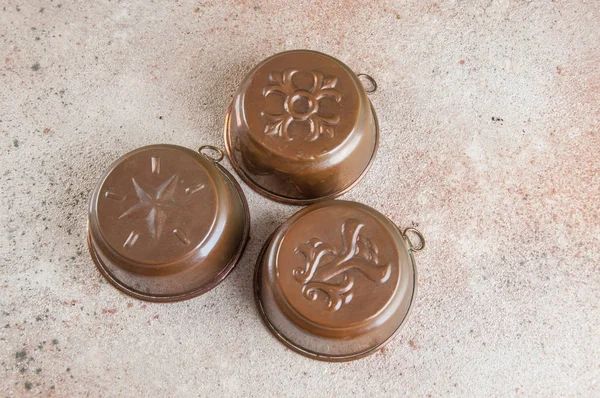 Vintage Copper Cookie Molds Concrete Background Copy Space Text — Stock Photo, Image
