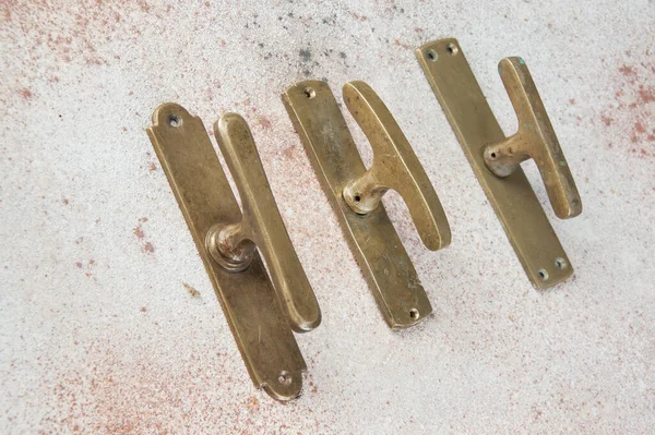 Old Bronze Handles Concrete Background Copy Space Text — Stock Photo, Image