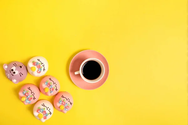 the cake and coffee on a yellow background, layout
