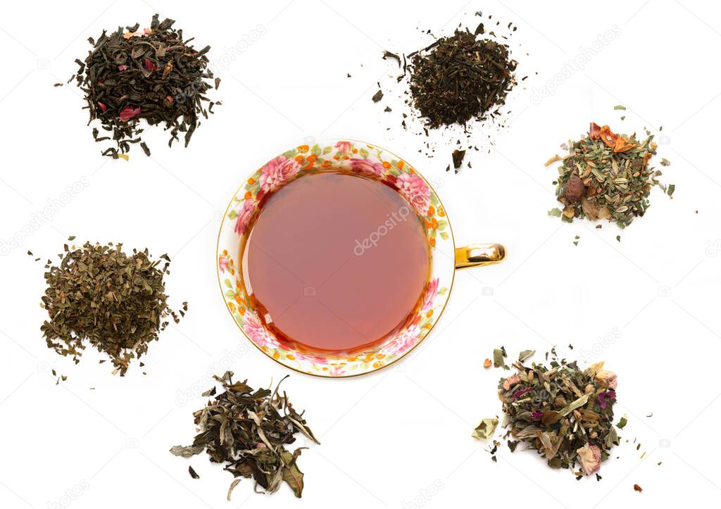 Assortment of dried tea with a cup of tea