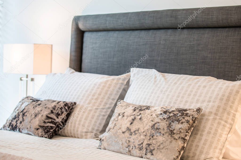 Cosy cushions on a bed