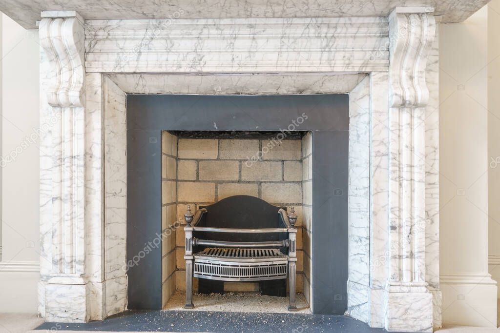 Traditional large fireplace in a living room 