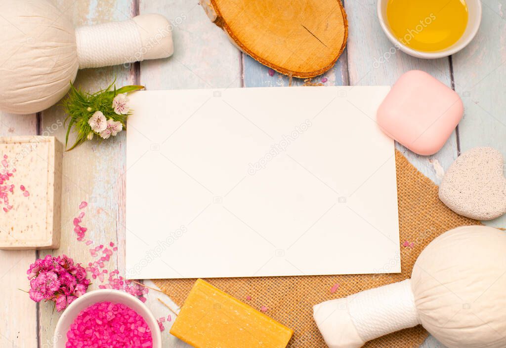 White page surrounded by spa objects