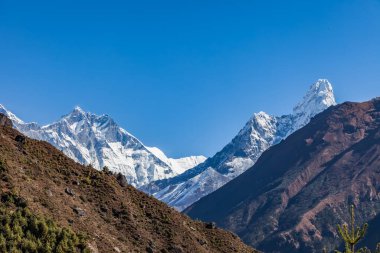Trekking around Namche Bazaar and views to Everest Sagamatha National Park Nepal clipart