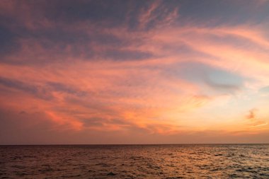 Sunset over the Ocean on the caribbean island of Curacao clipart