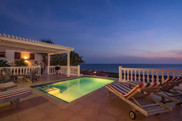 Sunset drinks by the swimming pool - Curacao coastline