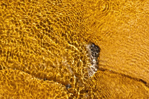 Hot running water, Mud and Bacteria next to a Geyser, Upper Geyser Basin, Yellowstone National Park