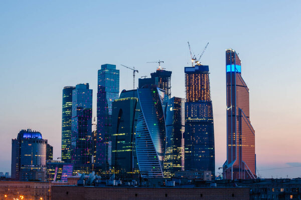 MOSCOW - JUL 24, 2014: Skyscrapers Moscow City at sunset during construction