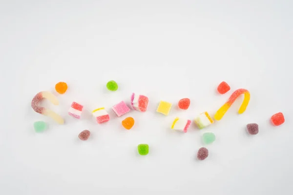 キャンディやお菓子の多色背景の抽象的な配置 — ストック写真