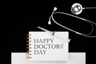 Teşekkürler, doktorlar. Doktor Günü konsepti. Stetoskop ve üzerinde 