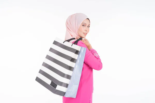 Beautiful Excited Muslim Female Model Traditional Pink Modern Kurung Carrying — Stock Photo, Image