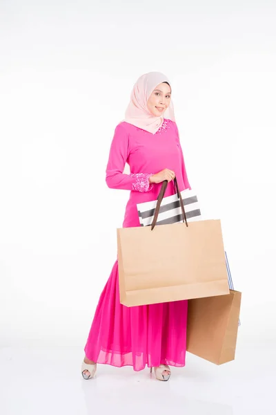 Beautiful Excited Muslim Female Model Traditional Pink Modern Kurung Carrying — Stock Photo, Image