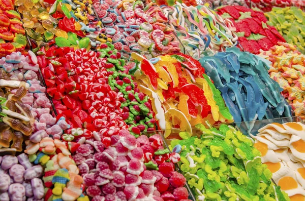 Şekerleme Pazar stok raflar. Renkli tatlılar çeşitli