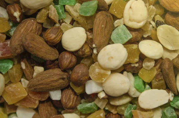 Background of a mixture of nuts, frets and sweets