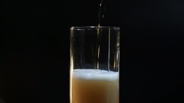 Beer Pouring Glass Close Black Background Cold Light Beer Glass — Stock Video
