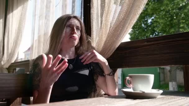 Young Woman Chatting Friend Cafe Drinking Coffee Socializing Enjoying Conversation — Stock Video