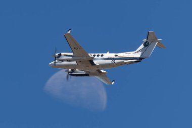 Avalon, Australia - March 4, 2013: Royal Australian Air Force (RAAF) Beechcraft King Air 350 A32-350 from 32 Squadron based at RAAF East Sale in Victoria. clipart