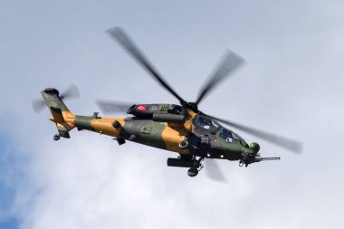 Farnborough, UK - July 16, 2014: Turkish Army (Turk Kara Kuvvetleri) tai (AgustaWestland) T129 atak Attack Helicopter. clipart