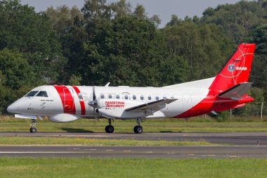 Farnborough, İngiltere - 18 Temmuz 2014: Saab 340B MSA Denizcilik Güvenliği (Deniz Devriyesi) SE-MCG.