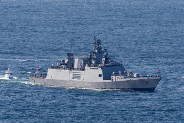 Sydney, Australia - October 4, 2013: INS Sahyadri (F49) Shivalik-class stealth multi-role frigate of the Indian Navy. clipart