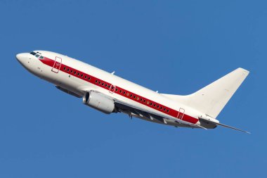 Las Vegas, Nevada, USA - May 8, 2013: Boeing 737 operated by defense contractor EG&G (Janet Airlines) to transport workers to and from the highly secretive and famous Area 51 base at Groom Lake. clipart