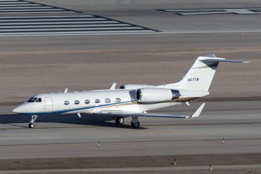 Las Vegas, Nevada, USA - May 7, 2013: Gulfstream G-IV luxury business jet N67TM at McCarran International Airport Las Vegas. clipart