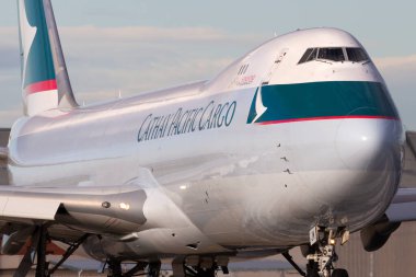 Melbourne, Australia - June 23, 2015: Cathay Pacific Cargo Airways Boeing 747-8 Cargo Aircraft B-LJM preparing for takeoff from Melbourne International Airport. clipart