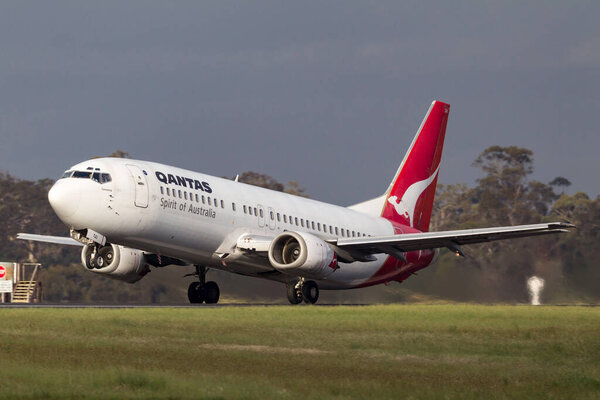 Melbourne, Australia - November 10, 2011: Qantas Boeing 737-476 VH-TJU departing Melbourne International Airport. 