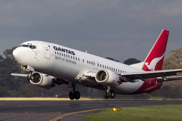 Melbourne, Australia - November 10, 2011: Qantas Boeing 737-476 VH-TJU departing Melbourne International Airport. 