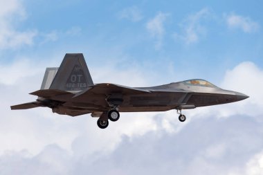 Nellis Air Force Base, Nevada, USA - May 7, 2013: United States Air Force (USAF) Lockheed Martin F-22A Raptor (99-4010) belonging to the 422 Test and Evaluation Squadron, 53rd Test and Evaluation group based at Nellis Air Force Base. clipart