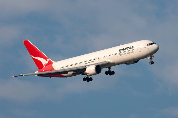 Melbourne, Australia - September 28, 2011: Qantas Boeing 767-338 / ER VH-OGN turning on approach to land at Melbourne International Airport
.