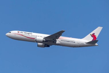 Sydney, Australia - October 7, 2013: Air Niugini Boeing 767 airliner taking off from Sydney Airport. clipart
