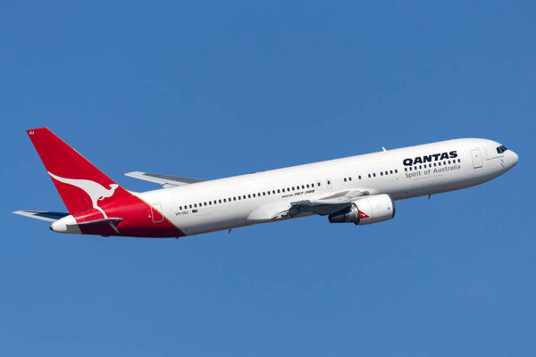Sydney, Australia - October 8, 2013: Qantas Boeing 767 airliner taking off from Sydney Airport.