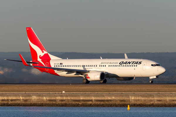  Sydney, Australia - October 9, 2013: Qantas Boeing 737 commercial airliner at Sydney Airport.
