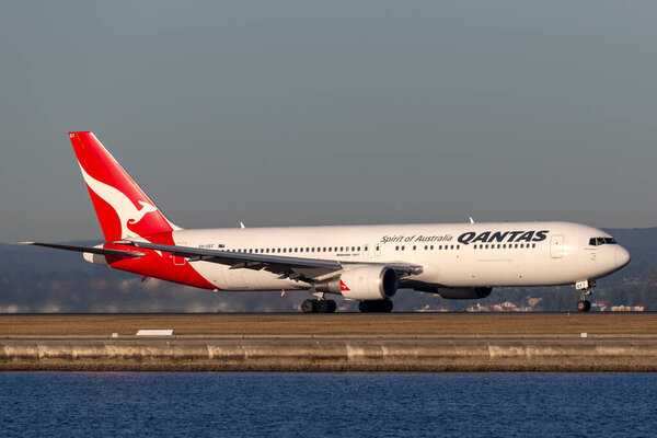 Sydney, Australia - October 9, 2013: Qantas Boeing 767 airliner taking off from Sydney Airport.