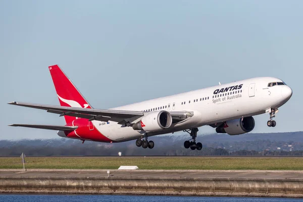 stock image Sydney, Australia - May 5, 2014: Qantas Boeing 767 airliner taking off from Sydney Airport. 