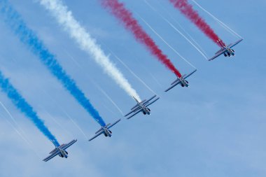 Payerne, Switzerland - August 30, 2014: Patrouille de France, the aerobatic display team of the French Air Force (Armee de lAir) flying Dassault-Dornier Alpha Jet E jet trainer aircraft. 
