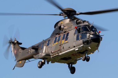 Payerne, Switzerland - August 30, 2014: Swiss Air Force Aerospatiale AS532 (TH98) military utility helicopter T-340. clipart