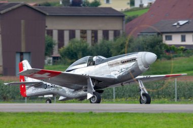 Payerne, Switzerland - August 29, 2014: 1944 North American P-51D Mustang fighter aircraft Moonbeam McSwine F-AZXS.