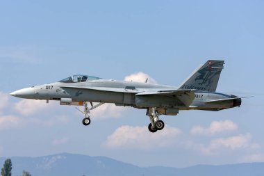 Payerne, Switzerland - September 4, 2014: Swiss Air Force McDonnell Douglas F/A-18C Hornet multirole fighter aircraft. clipart