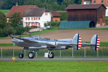 Payerne, Switzerland - August 29, 2014: Lockheed P-38 Lightning World War II fighter aircraft operated by The Flying Bulls Collection.
