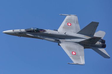 Payerne, Switzerland - September 4, 2014: Swiss Air Force McDonnell Douglas F/A-18C Hornet multirole fighter aircraft. clipart