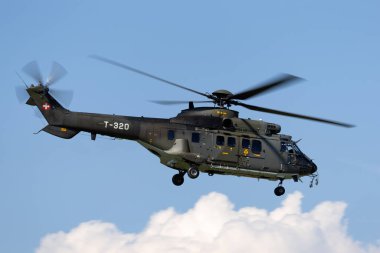 Payerne, Switzerland - September 5, 2014: Swiss Air Force Aerospatiale AS332 (TH89) military utility helicopter T-320.