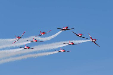 Payerne, Switzerland - August 31, 2014: Swiss Air Force PC-7 display team flying Pilatus PC-7 trainer aircraft.