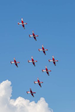 Payerne, Switzerland - September 7, 2014: Swiss Air Force PC-7 display team flying Pilatus PC-7 trainer aircraft.