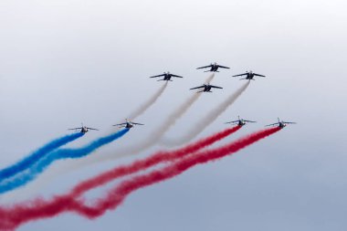Payerne, Switzerland - September 1, 2014: Patrouille de France, the aerobatic display team of the French Air Force (Armee de lAir) flying Dassault-Dornier Alpha Jet E jet trainer aircraft. 