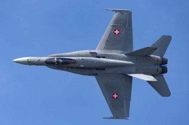 Payerne, Switzerland - September 4, 2014: Swiss Air Force McDonnell Douglas F/A-18C Hornet multirole fighter aircraft. clipart