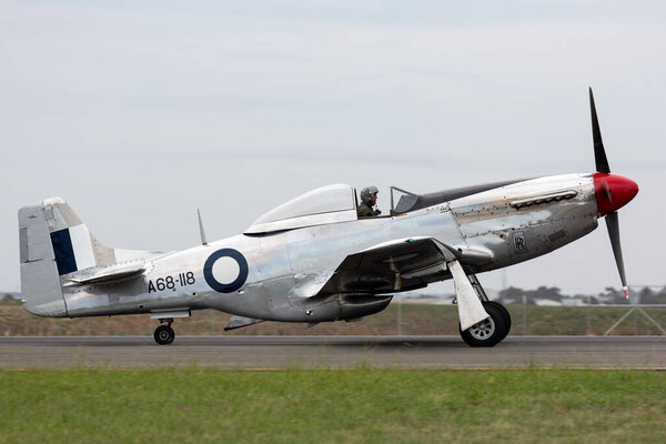 Avalon, Australia - February 27, 2015: Former Royal Australian Air Force (RAAF) Commonwealth Aircraft Corporation CA-18 Mustang VH-AGJ (North American P-51D Mustang) world war II fighter plane.